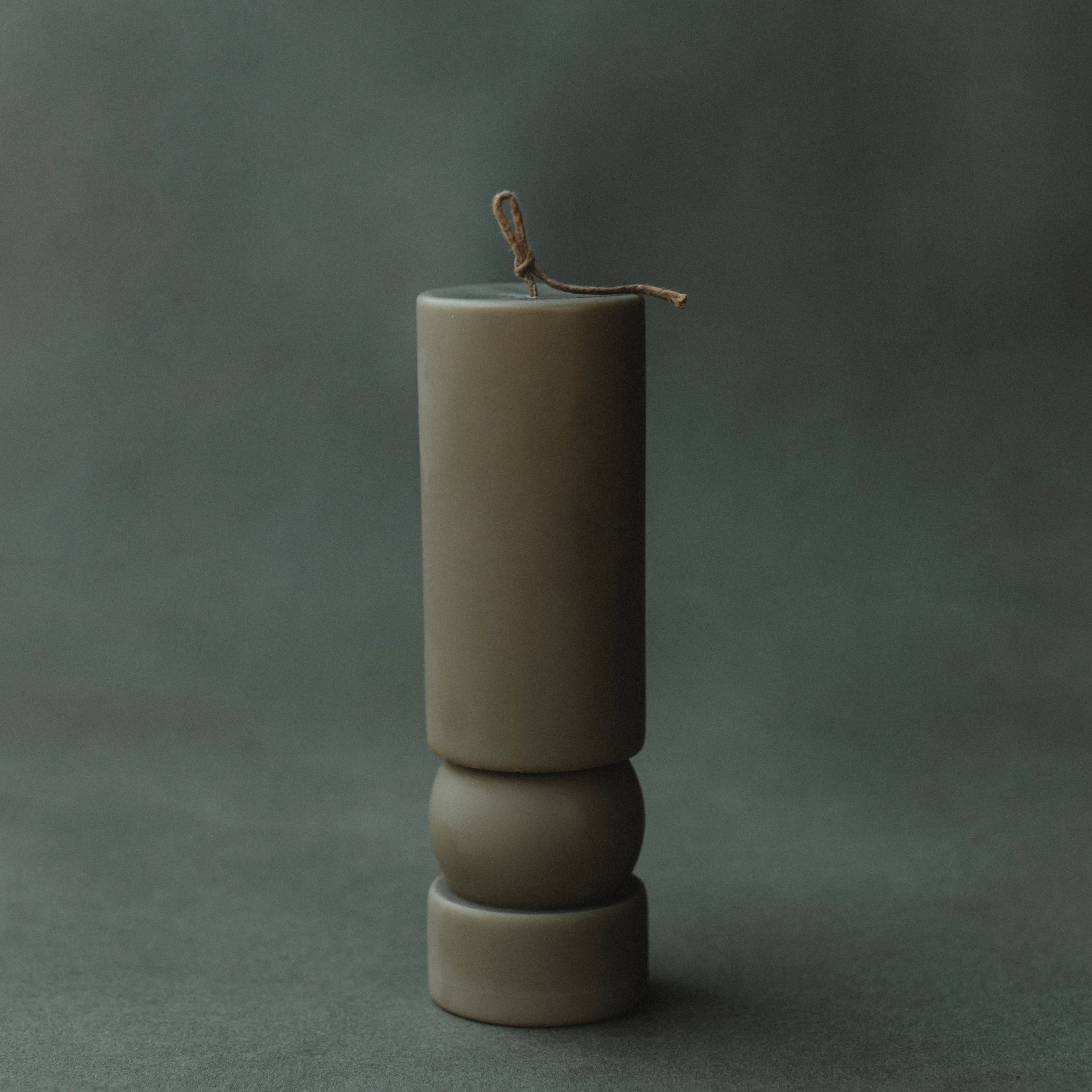 Earthy green Zen sculptural soy wax candle by LAWA, modern pillar design for contemporary home styling and unique gifting for holidays