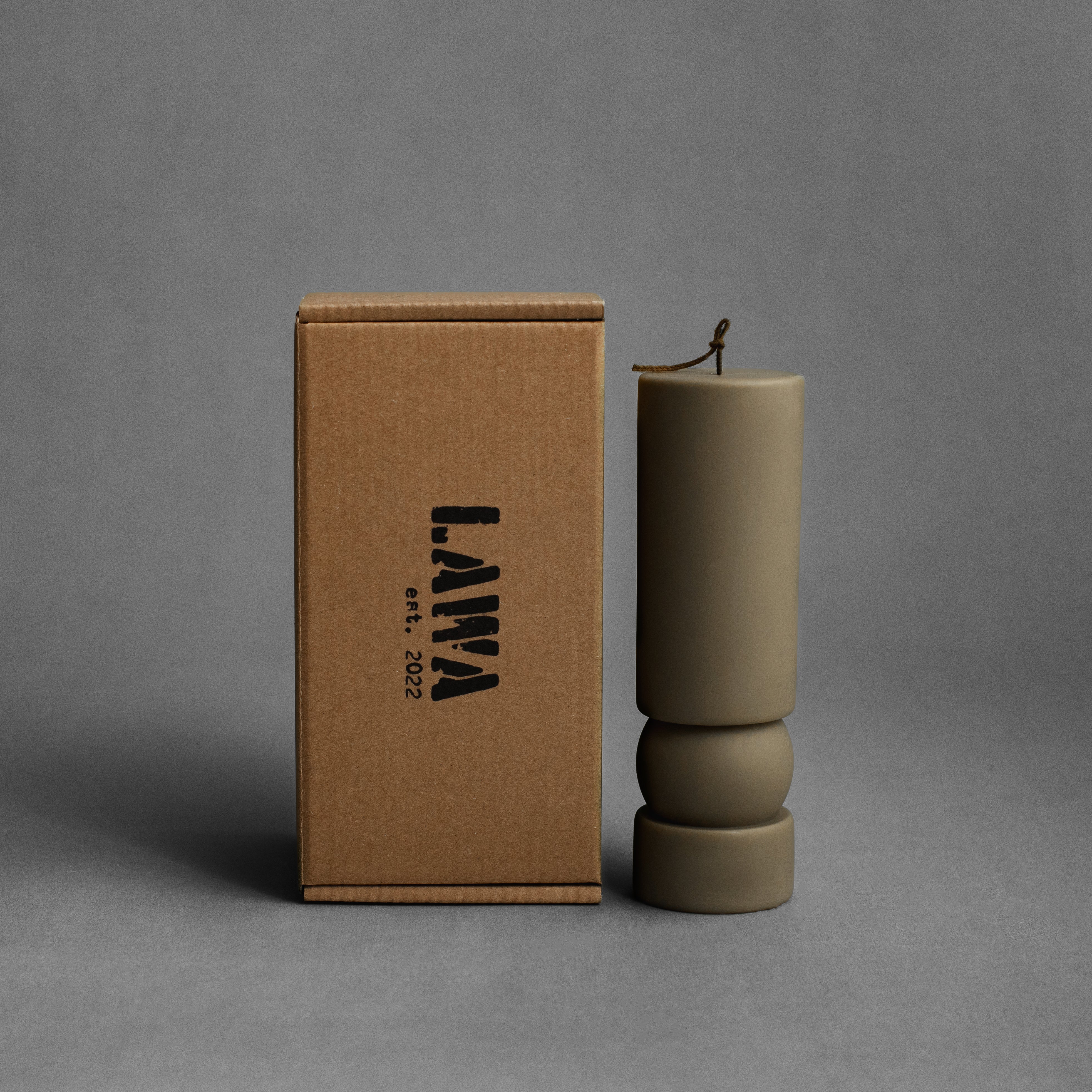 “Earthy green Zen sculptural soy wax candle by LAWA, modern pillar design for contemporary home styling with the box used to pack this candle which is perfectly suitable for a gift box