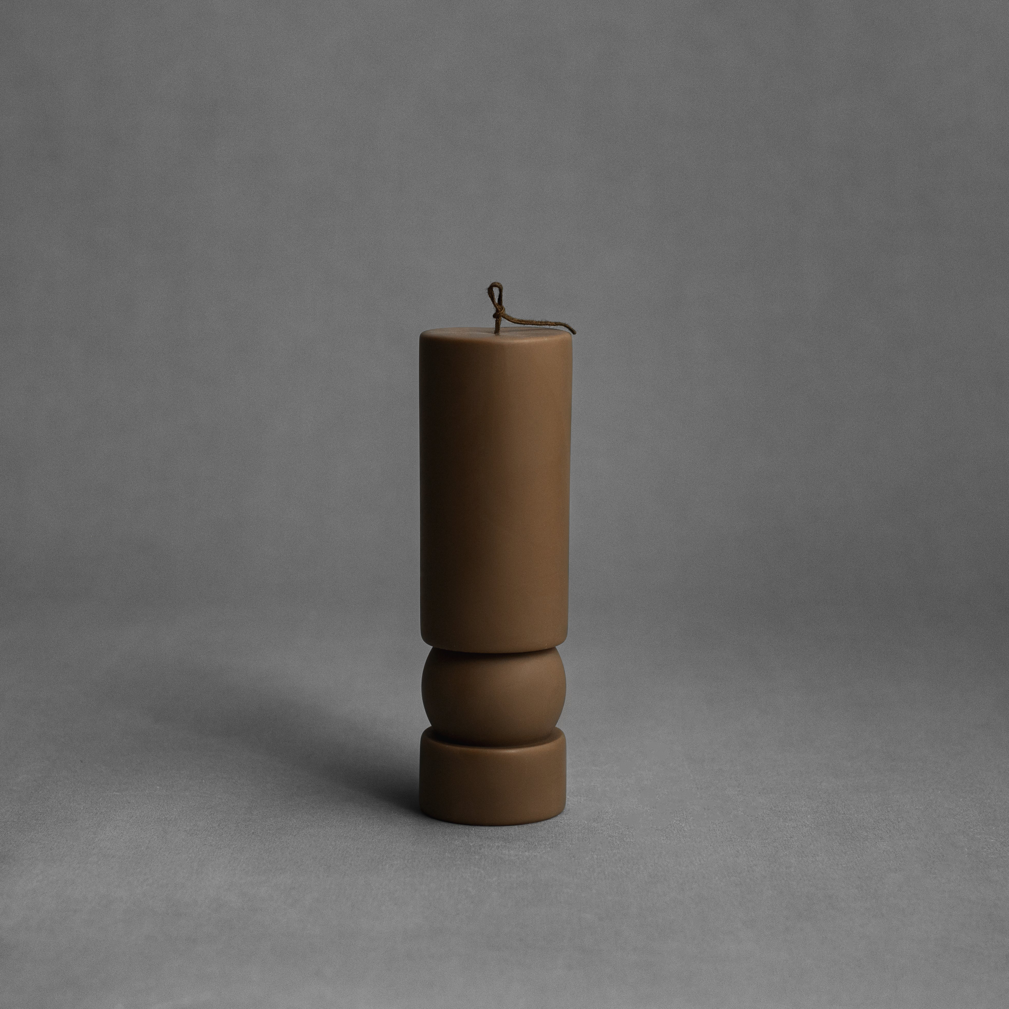 Kobicha brown Zen sculptural soy wax candle by LAWA with a smooth pillar shape for warm modern decor